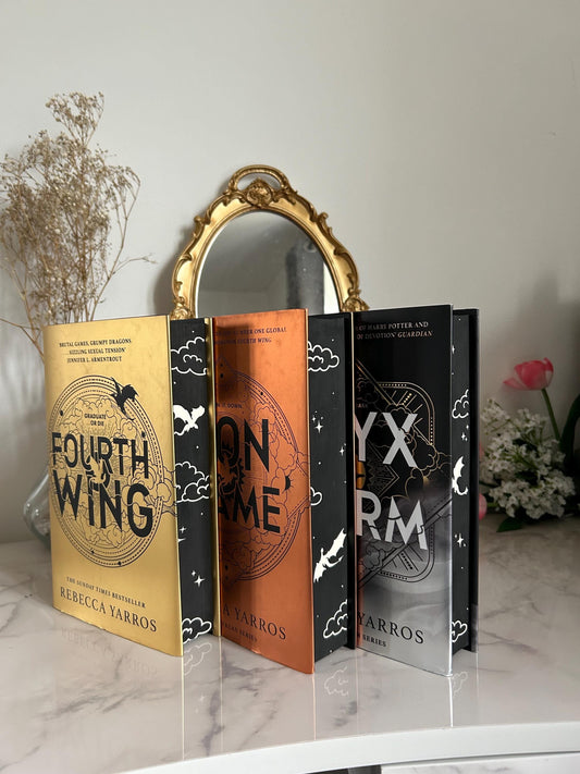 Fourth Wing, Iron Flame and Onyx Storm by Rebecca Yarros with sprayed edges