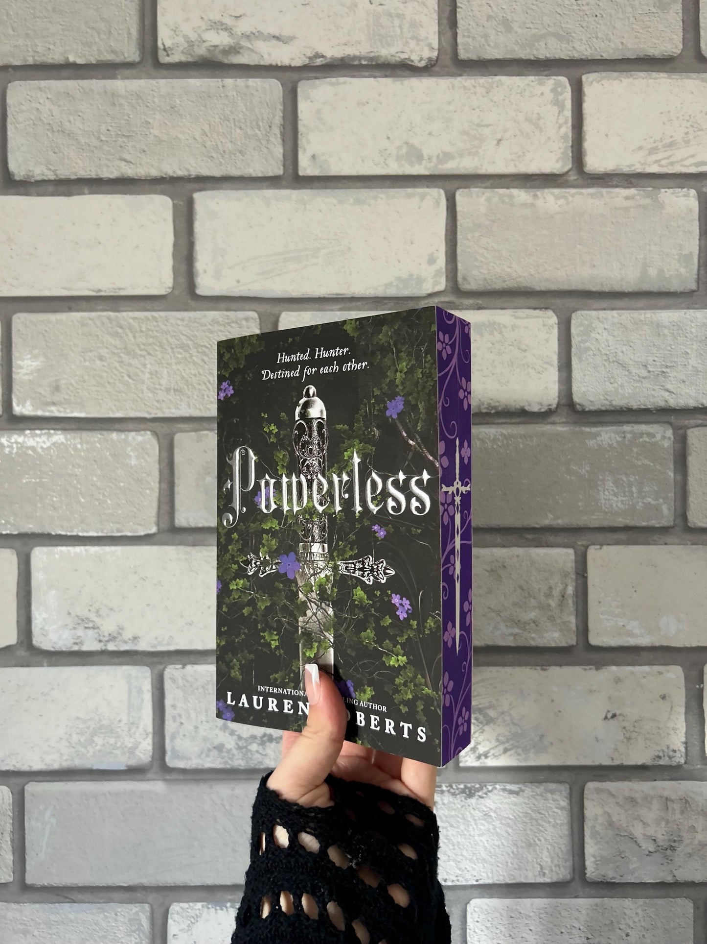 Powerless, Reckless and Powerful paperbacks with sprayed edges