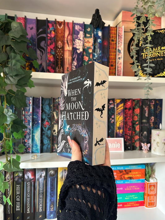 When The Moon Hatched paperback with hand painted edges