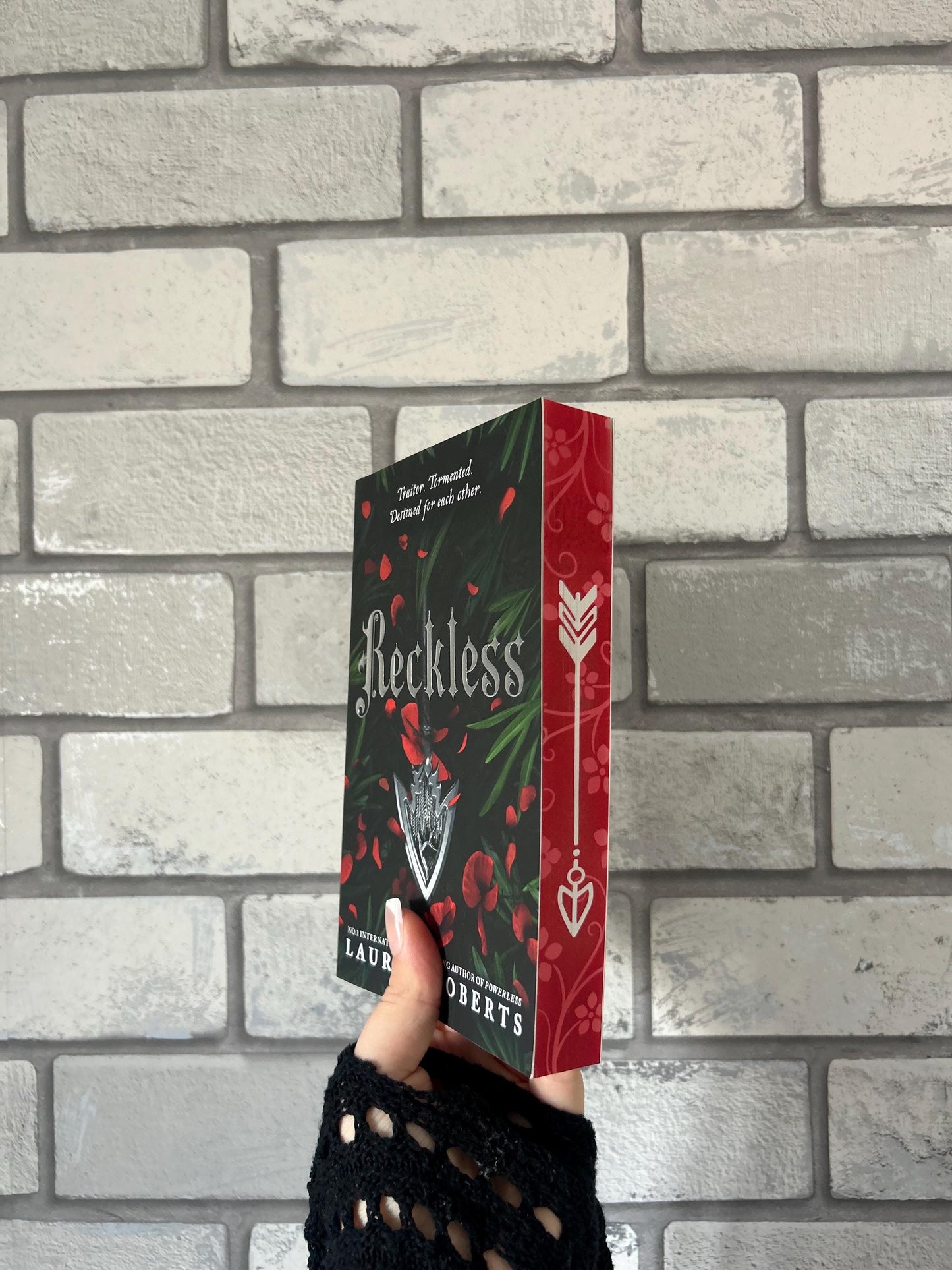 Powerless, Reckless and Powerful paperbacks with sprayed edges