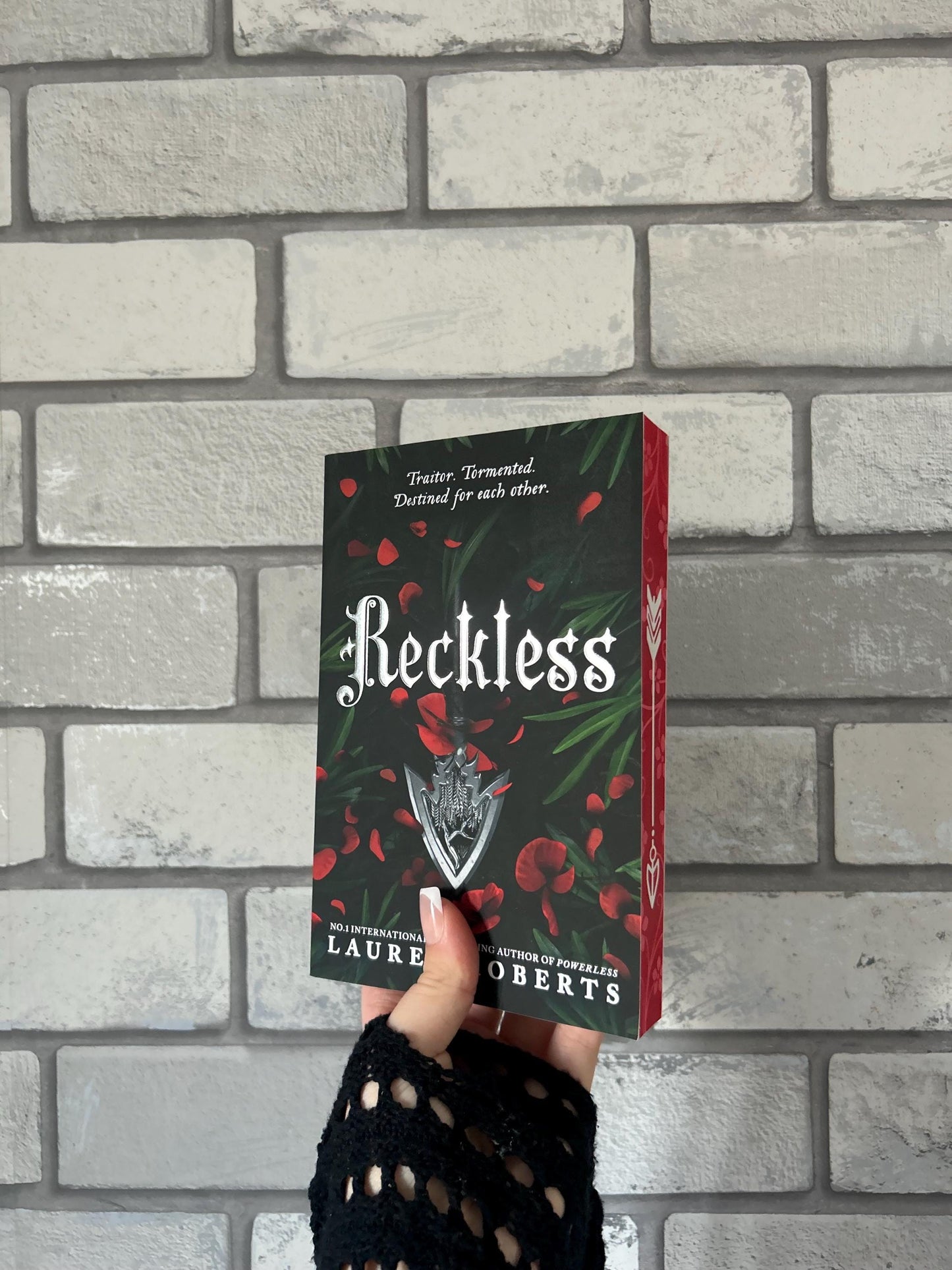Powerless, Reckless and Powerful paperbacks with sprayed edges