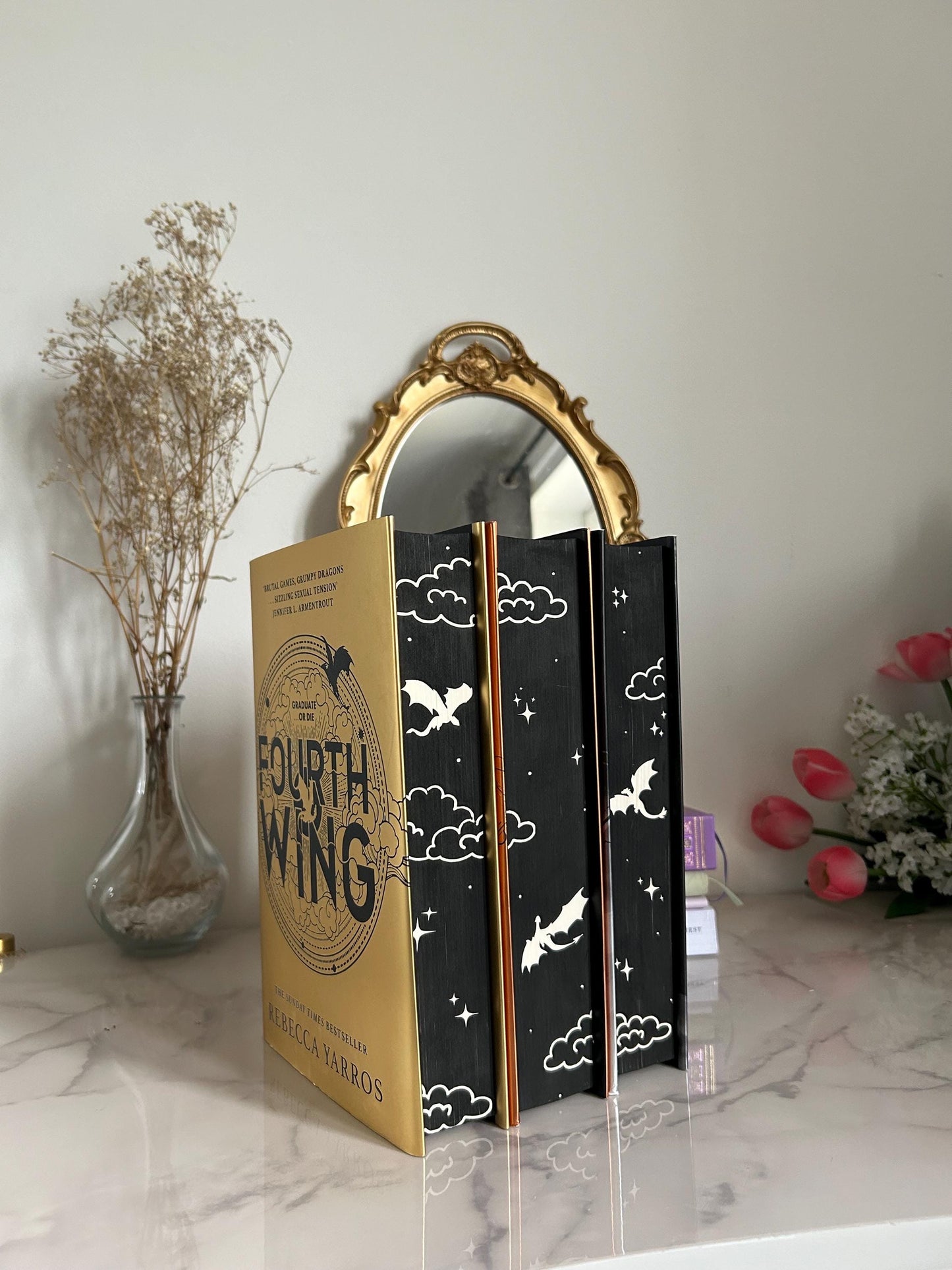 Fourth Wing, Iron Flame and Onyx Storm by Rebecca Yarros with sprayed edges