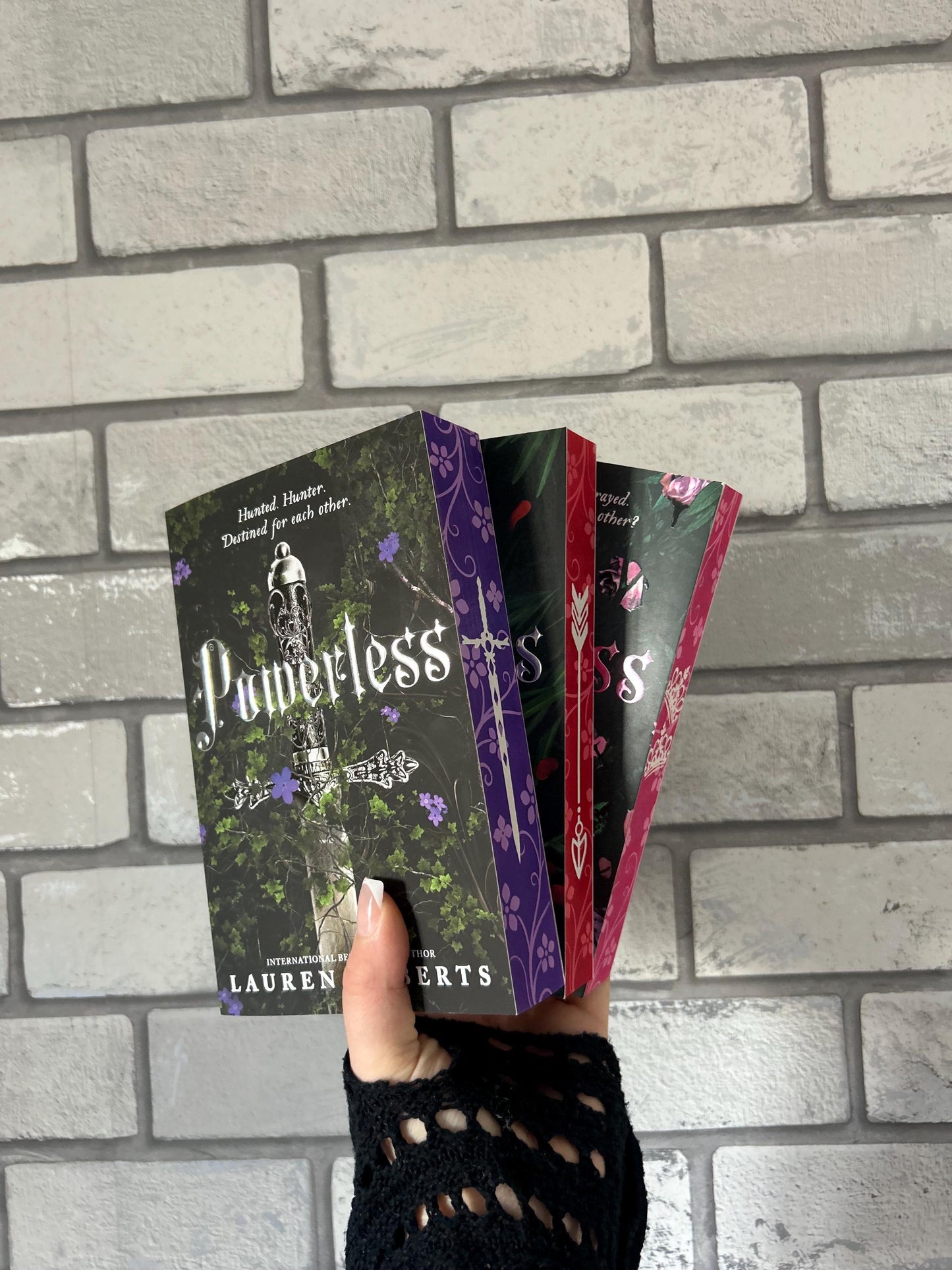 Powerless, Reckless and Powerful paperbacks with sprayed edges