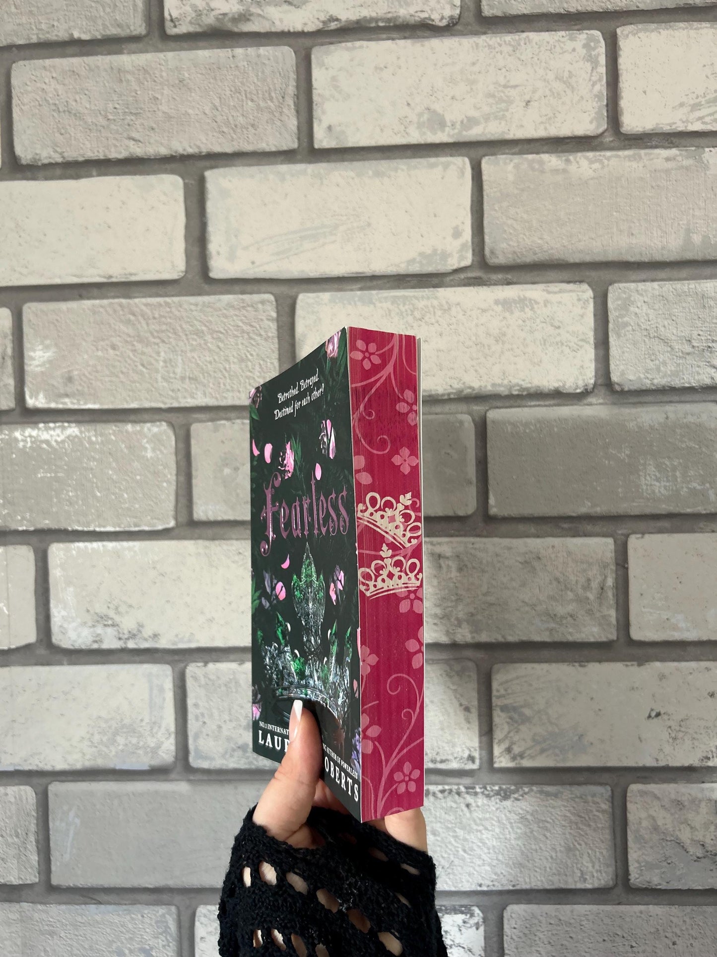 Powerless, Reckless and Powerful paperbacks with sprayed edges