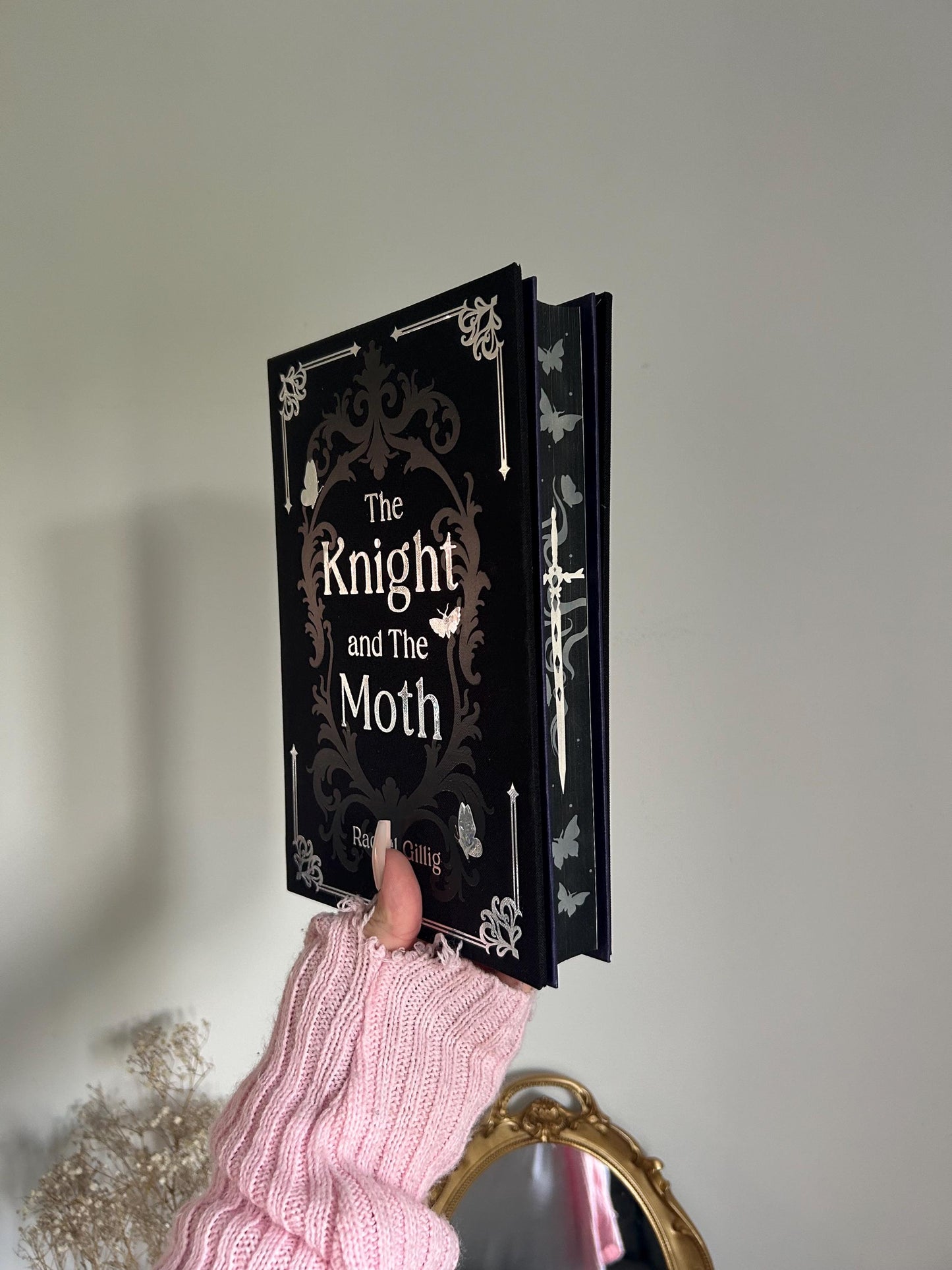 The Knight and The Moth rebind with sprayed edges by Rachel Gillig