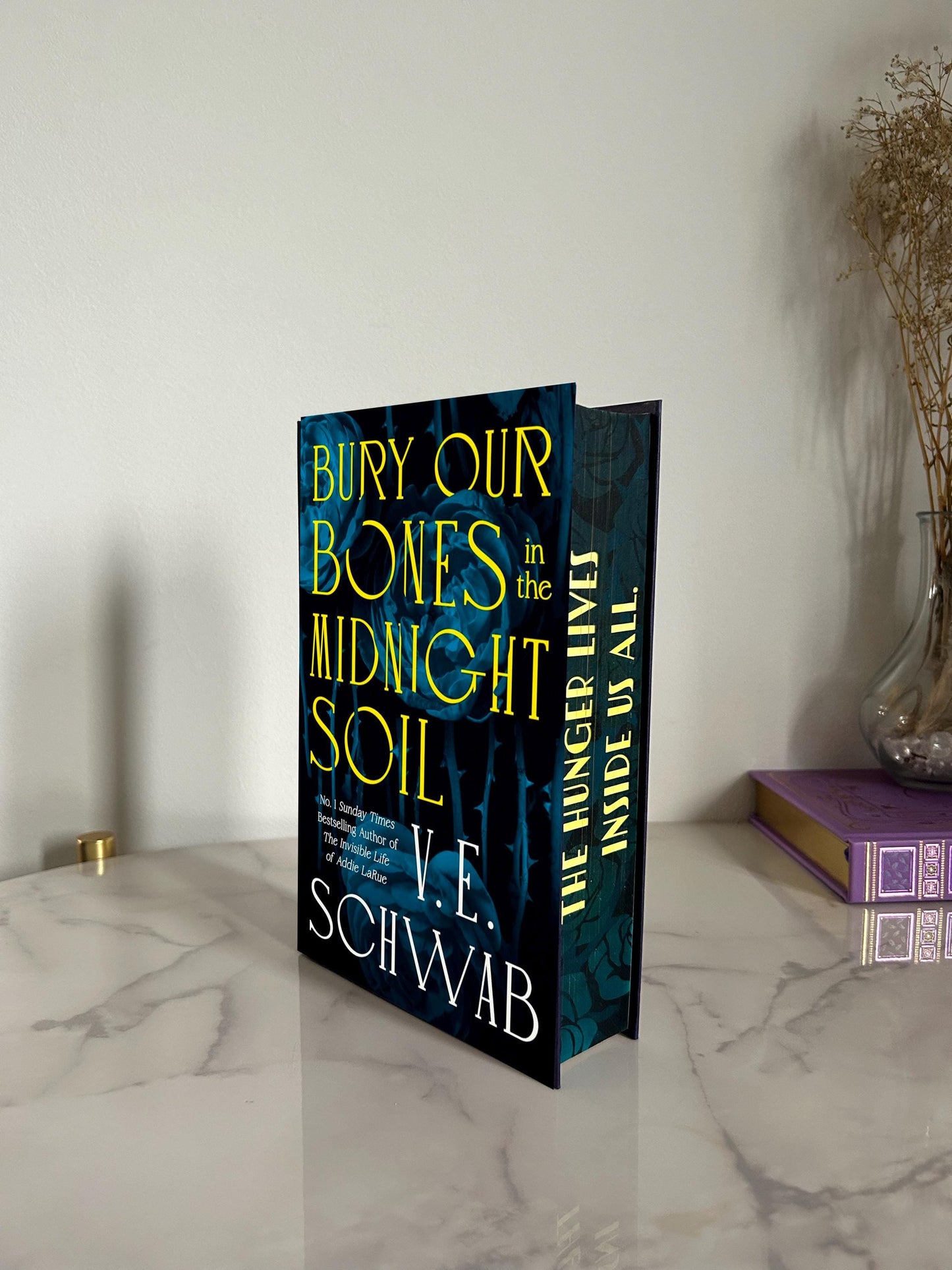 Bury Our Bones in the Midnight Soil by V.E. Schwab with sprayed edges