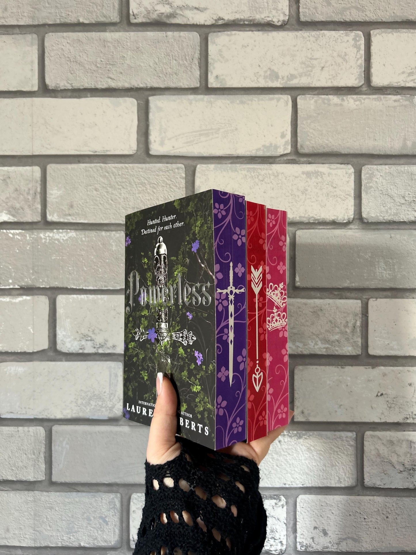 Powerless, Reckless and Powerful paperbacks with sprayed edges