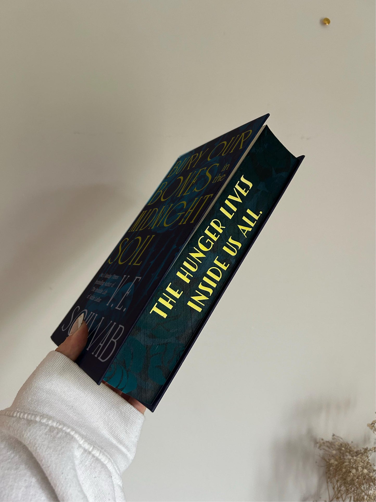 Bury Our Bones in the Midnight Soil by V.E. Schwab with sprayed edges